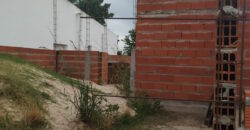 TERRENO CON CASA EN CONSTRUCCION