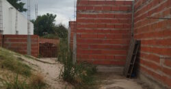 TERRENO CON CASA EN CONSTRUCCION