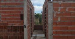 TERRENO CON CASA EN CONSTRUCCION