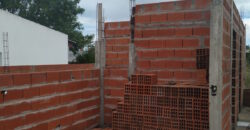 TERRENO CON CASA EN CONSTRUCCION